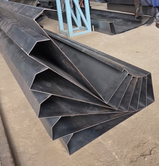 Folded custom profile with a hooked foot