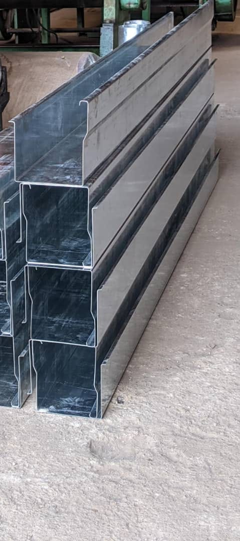 Stack of stainless steel rain gutters