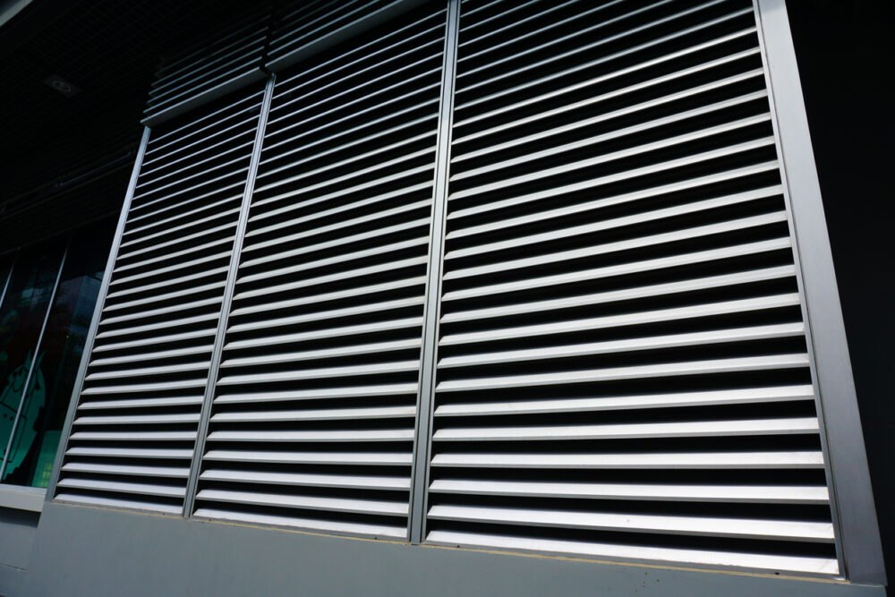 Louvered ventilation panels in galvanized steel